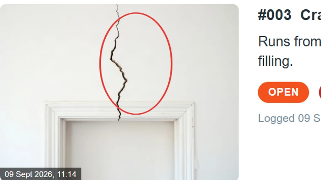 A photograph of a cracked wall with the crack circled in red and the capture time printed into the corner